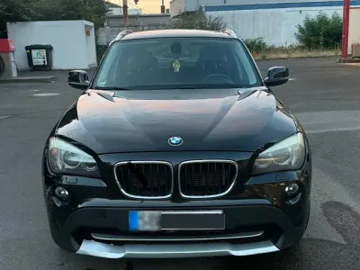 Gebraucht BMW X1 176 PS (129 kW) 2011 Schwarz SUV