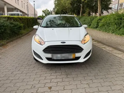 Używany Ford Fiesta Trend 82 KM (60 kW) 2013 Biały Hatchback
