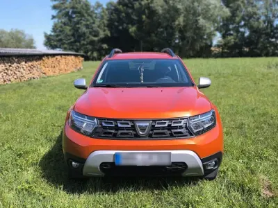 Używany Dacia Duster Extreme 91 KM (66 kW) 2022 Pomarańczowy SUV