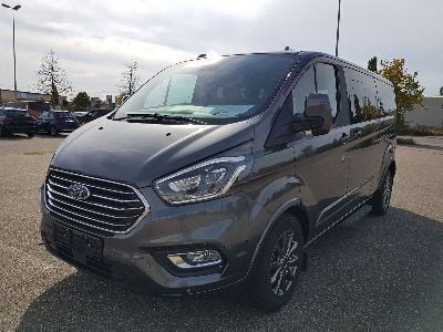 gebraucht Ford Tourneo Custom L2 Titanium X mHEV 150 8 Sitz Klima Vor+Hint PDC Temp SHZ LMF Kamera NAVI Xenon Leder AHK 230V