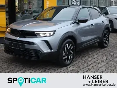 Gebraucht Opel Mokka 136 PS (100 kW) 2024 Kontrast grau SUV