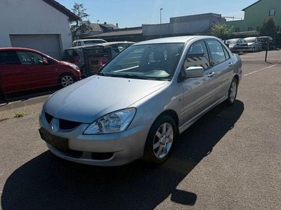 Second-hand Mitsubishi Lancer Comfort Edition 98 CP (72 kW) 2004 Argintiu Berlinǎ