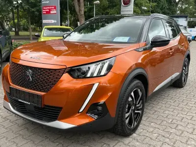 Gebraucht Peugeot e-2008 GT 100 kW (136 PS) 2021 Orange fusion (metallic) SUV