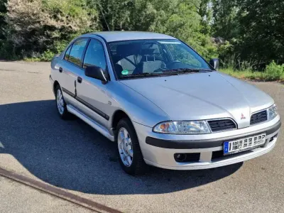 Begagnad Mitsubishi Carisma 125 HK (91 kW) 1999 Silver Sedan