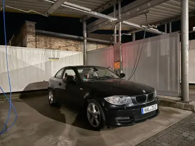 Usata BMW 120 Performance 177 CV (130 kW) 2010 Nero Utilitaria