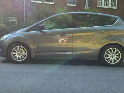 Gebraucht Ford C-MAX Titanium 150 PS (110 kW) 2012 Braun Van / Kleinbus