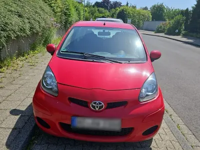 Gebraucht Toyota Aygo 68 PS (50 kW) 2009 Rot Kleinwagen