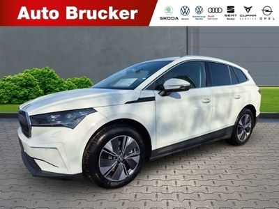 Weiss Gebraucht 2024 Skoda Enyaq iV Loft SUV | 56.000 €
