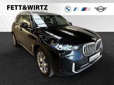 Gebraucht BMW X5 Sport Line 489 PS (359 kW) 2024 Black sapphire metallic SUV