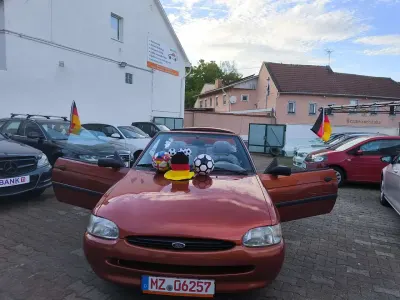 Gebraucht Ford Escort Cabriolet Ghia 90 PS (66 kW) 1997 Orange Cabrio