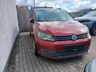 Gebraucht VW Touran Highline 105 PS (77 kW) 2010 Rot Van / Kleinbus