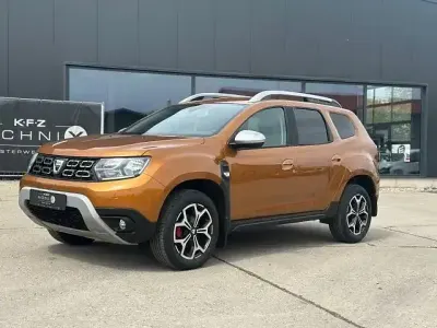 Używany Dacia Duster Prestige 109 KM (80 kW) 2018 Pomarańczowy SUV