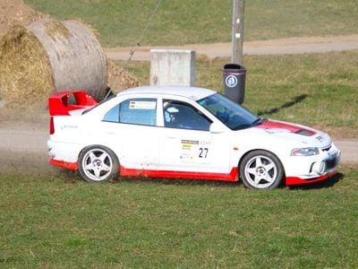 Second-hand Mitsubishi Lancer 280 CP (205 kW) 1999 Alb Berlinǎ