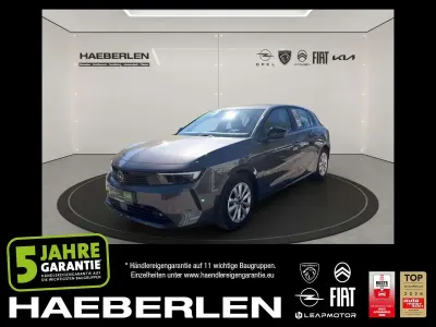 Używany Opel Astra Enjoy 110 KM (80 kW) 2023 Szary Sedan/Limuzyna