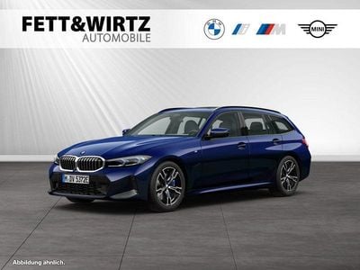 Gebraucht BMW 330e M Sport 292 PS (214 kW) 2024 Bmw individual tansanitblau metallic Kombi