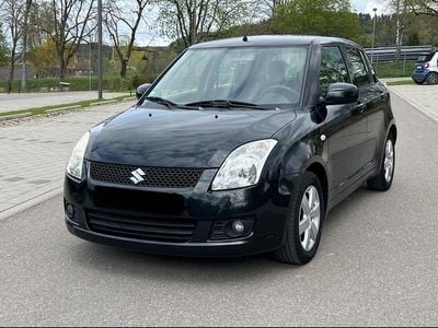 Second-hand Suzuki Swift 102 CP (75 kW) 2009 Negru Hatchback
