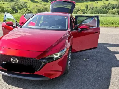 Używany Mazda 3 Selection 122 KM (89 kW) 2019 Czerwony Sedan/Limuzyna