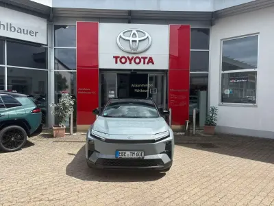 Gebraucht Toyota C-HR+ Lounge 252 kW (343 PS) 2026 Cement grey (1h5)/ attitude bl SUV