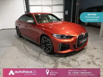 Second-hand BMW M440 M Sport 374 CP (275 kW) 2022 Portocaliu Berlinǎ