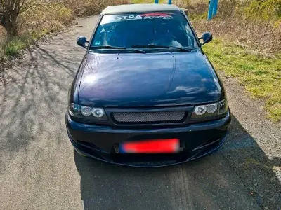 Używany Opel Astra Cabriolet 115 KM (84 kW) 1994 Purpurowy Kabriolet