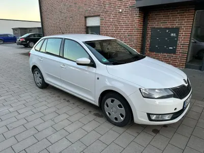 Używany Skoda Rapid Ambition 105 KM (77 kW) 2014 Biały Hatchback