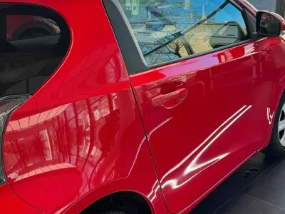 Używany Toyota iQ 68 KM (50 kW) 2009 Czerwony Hatchback