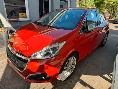 Gebraucht Peugeot 208 99 PS (72 kW) 2015 Orange Kleinwagen
