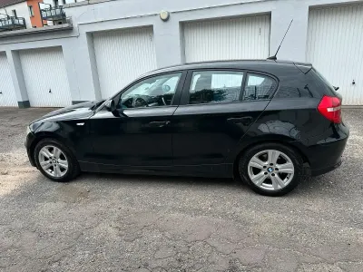 Gebraucht BMW 116 116 PS (85 kW) 2006 Schwarz Kleinwagen