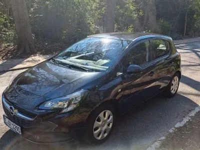 Używany Opel Corsa Edition 90 KM (66 kW) 2016 Czarny Hatchback