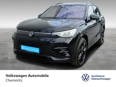 Gebraucht VW Tiguan R-line 272 PS (200 kW) 2025 0e grenadillschwarz metallic SUV