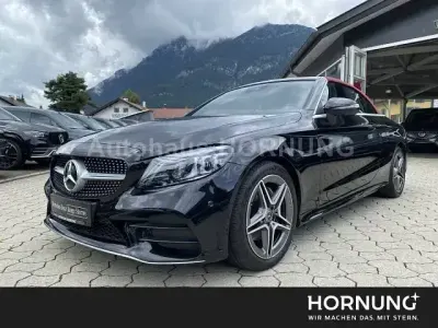 Gebraucht Mercedes C200 AMG 184 PS (135 kW) 2023 Metalliclack obsidianschwarz Cabrio