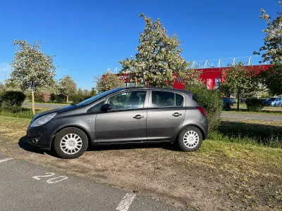 Używany Opel Corsa Edition 87 KM (63 kW) 2010 Szary Hatchback