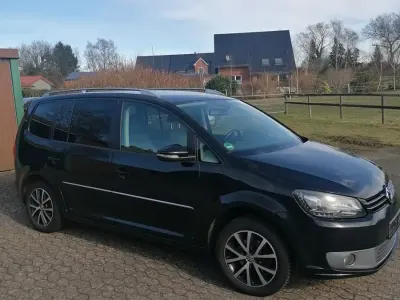 Gebraucht VW Touran 105 PS (77 kW) 2011 Schwarz Van / Kleinbus