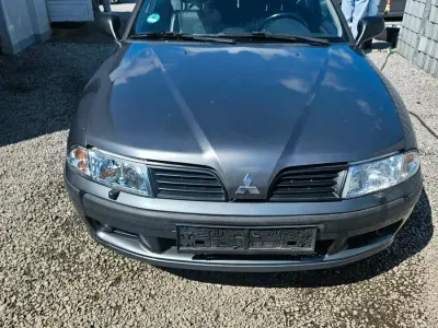 Gebraucht Mitsubishi Carisma 105 PS (77 kW) 2002 Grau Limousine