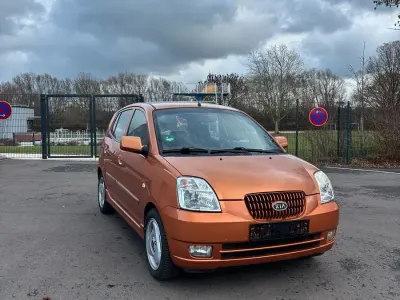 Używany Kia Picanto 65 KM (47 kW) 2004 Pomarańczowy Hatchback