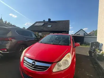 Gebraucht Opel Corsa Color Edition 80 PS (58 kW) 2009 Rot Kleinwagen