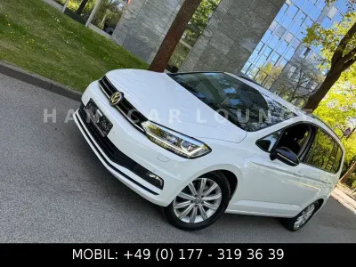 Second-hand VW Touran Highline 150 CP (110 kW) 2018 Alb Monovolum