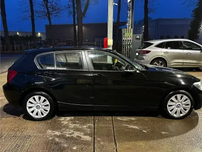 Gebraucht BMW 114 102 PS (75 kW) 2012 Schwarz Kleinwagen
