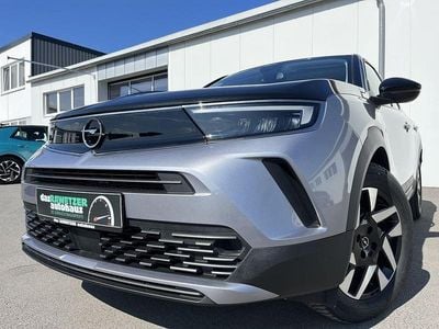 Gebraucht Opel Mokka-e Elegance 100 kW (136 PS) 2024 Kontrast grau SUV