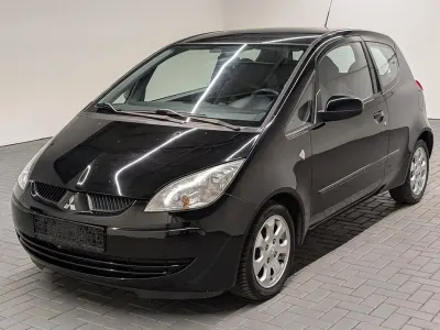 Gebraucht Mitsubishi Colt 95 PS (69 kW) 2006 Cosmosschwarz Kleinwagen