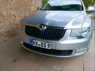 Używany Skoda Superb 170 KM (125 kW) 2012 Srebrny Kombi
