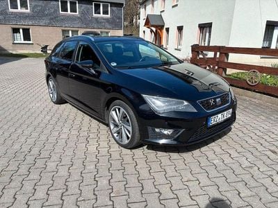 Używany Seat Leon ST FR 180 KM (132 kW) 2014 Czarny Kombi