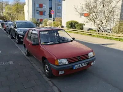 Gebraucht Peugeot 205 49 PS (36 kW) 1988 Rot Kleinwagen