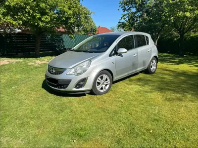 Second-hand Opel Corsa 95 CP (69 kW) 2012 Argintiu Hatchback