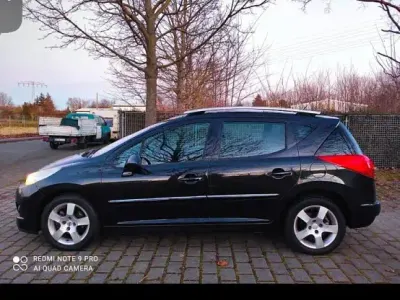 Gebraucht Peugeot 207 120 PS (88 kW) 2011 Schwarz Kombi
