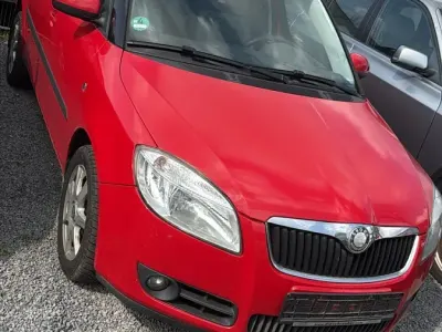 Gebraucht Skoda Roomster 77 PS (56 kW) 2008 Rot Van / Kleinbus