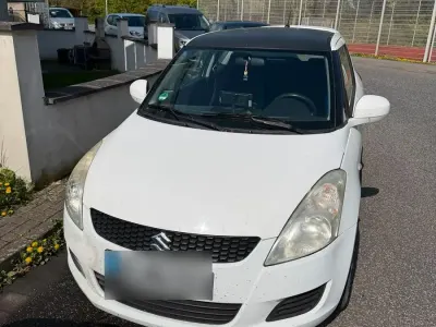 Usata Suzuki Swift 95 CV (69 kW) 2012 Bianco Utilitaria
