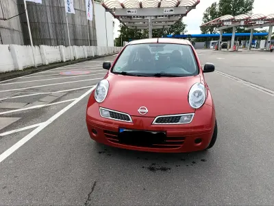 Gebraucht Nissan Micra 65 PS (47 kW) 2010 Rot Kleinwagen