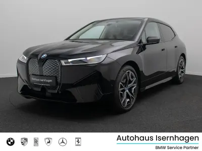 Gebraucht BMW iX Sport Line 384 kW (523 PS) 2023 Saphirschwarz475beige SUV