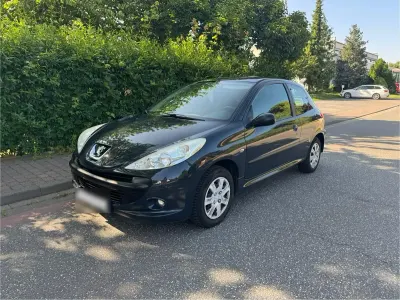 Gebraucht Peugeot 206+ 60 PS (44 kW) 2011 Grau Kleinwagen